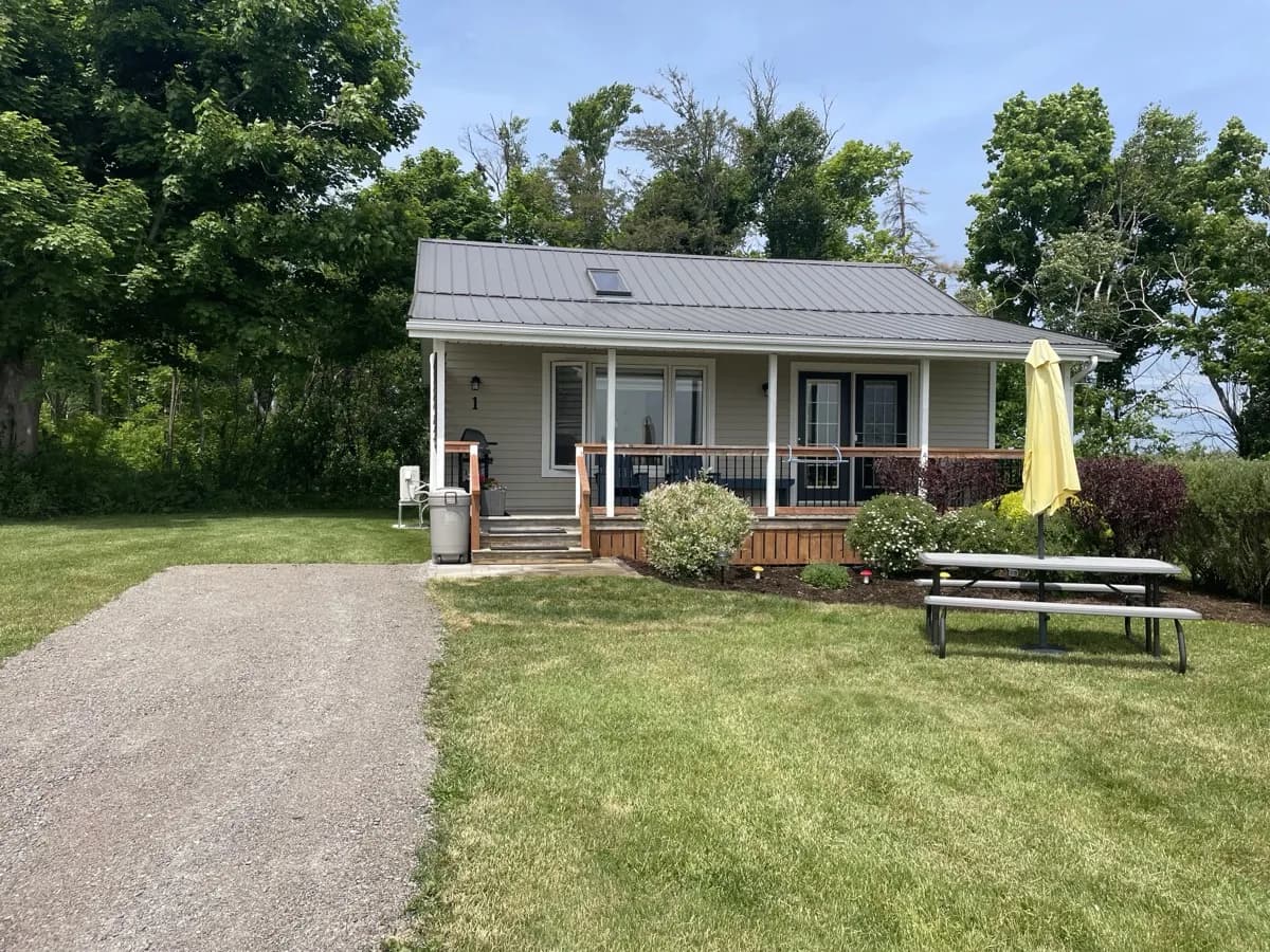 Garden path between cottages with tropical plants